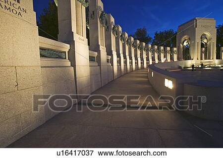 Stock Photo - U. S. World War II Memorial commemorating World War II in Washington D. C. at dusk. Fotosearch