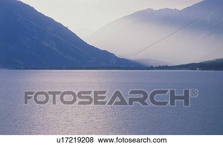 Stock Photo - View of Aspen and Rocky Mountains from lake. Fotosearch