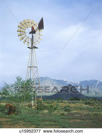 Stock Photo - Windmill on ranch near Roundtable Mountain, UT. Fotosearch