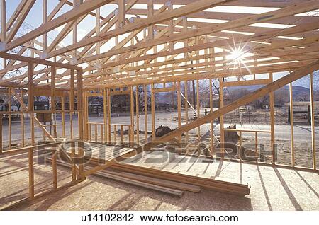 Wood frame of house under construction, Lone Pine, CA View Large Photo Image Stock Image - Wood frame of house under construction, Lone Pine, CA. Fotosearch