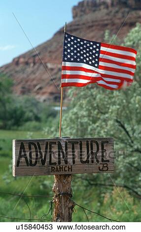 Wooden sign Adventure Ranch with American flag View Large Photo Image Stock Image - Wooden sign Adventure Ranch with American flag. Fotosearch