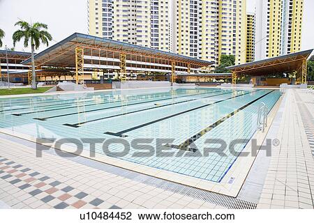 Swimming pool in front of buildings, Clementi Swimming Complex, Clementi, Singapore View Large Photo Image Stock Image - Swimming pool in front of buildings, Clementi Swimming Complex, Clementi, Singapore. Fotosearch
