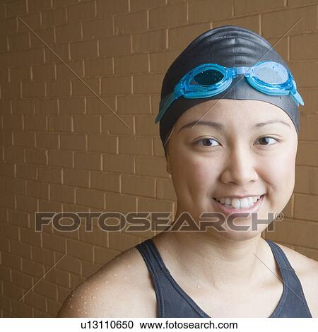 Portrait of a young woman in swimwear View Large Photo Image Stock Image - Portrait of a young woman in swimwear. Fotosearch