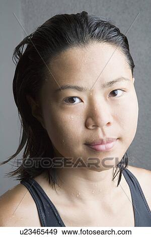 Portrait of a young woman View Large Photo Image Stock Photo - Portrait of a young woman. Fotosearch