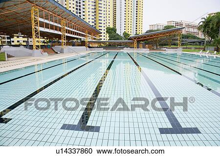 Swimming pool in front of buildings, Clementi Swimming Complex, Clementi, Singapore View Large Photo Image Stock Image - Swimming pool in front of buildings, Clementi Swimming Complex, Clementi, Singapore. Fotosearch