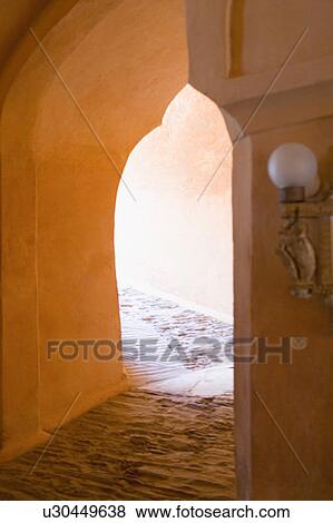 Stock Photo - Archway in an alley. Fotosearch
