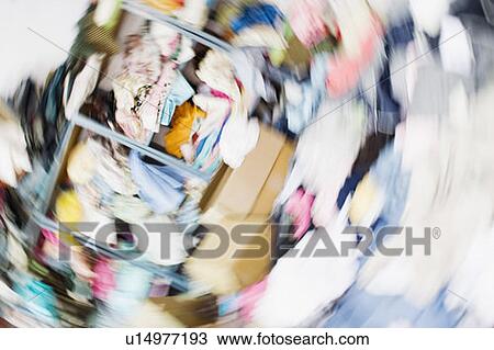 Stock Image - Blurred view of a textile industry. Fotosearch