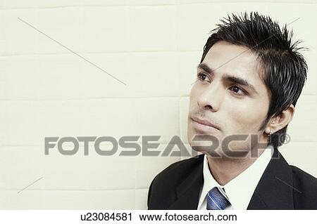 Businessman looking away View Large Photo Image Stock Image - Businessman looking away. Fotosearch