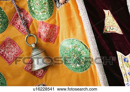 Stock Image - Close-up of a bell hanging. Fotosearch
