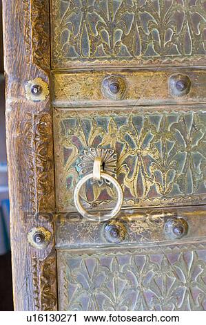 Stock Image - Close-up of a door knocker. Fotosearch