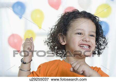 Close-up of a girl smiling View Large Photo Image Stock Photo - Close-up of a girl smiling. Fotosearch