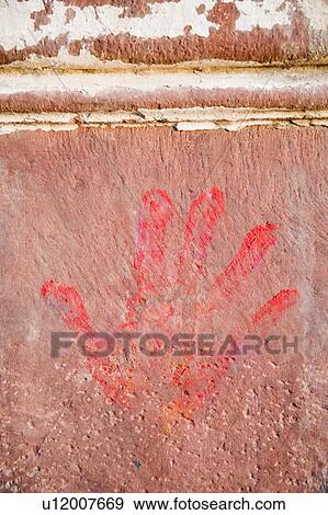 Close-up of a handprint on a wall View Large Photo Image Stock Photo - Close-up of a handprint on a wall. Fotosearch