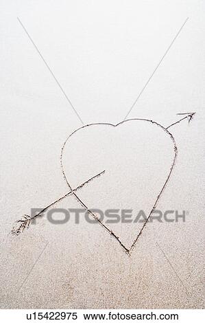Close-up of a heart shape drawn on the beach View Large Photo Image Stock Photography - Close-up of a heart shape drawn on the beach. Fotosearch