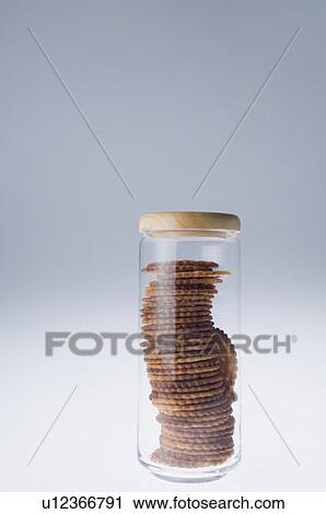 Stock Image - Close-up of a jar of biscuits. Fotosearch