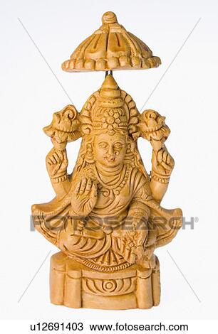 Close-up of a Laxmi idol View Large Photo Image Stock Image - Close-up of a Laxmi idol. Fotosearch