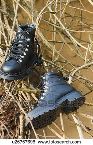 Stock Photo - Close-up of a pair of boots. Fotosearch