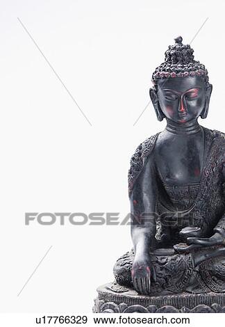 Close-up of a statue of Buddha View Large Photo Image Stock Photo - Close-up of a statue of Buddha. Fotosearch