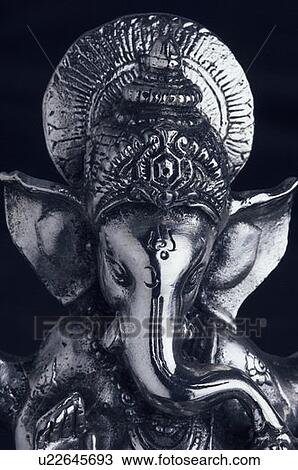 Stock Image - Close-up of a statue of God Ganesha. Fotosearch