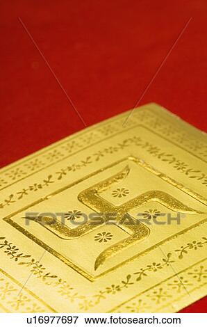 Stock Photo - Close-up of a swastika on a wedding invitation card. Fotosearch