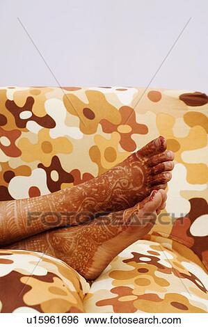 Close-up of a woman's henna tattooed feet View Large Photo Image Stock Photograph - Close-up of a woman's henna tattooed feet. Fotosearch