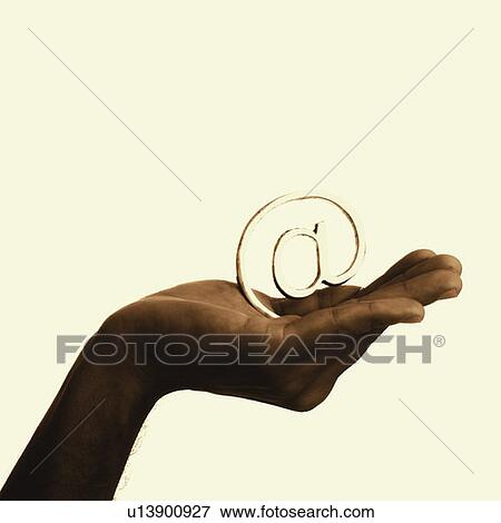 Close-up of an At symbol on a person's palm View Large Photo Image Stock Photo - Close-up of an At symbol on a person's palm. Fotosearch