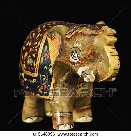 Stock Photograph - Close-up of an elephant figurine. Fotosearch