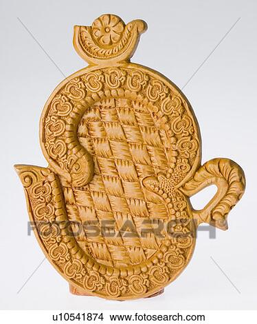 Picture - Close-up of an ohm symbol figurine. Fotosearch