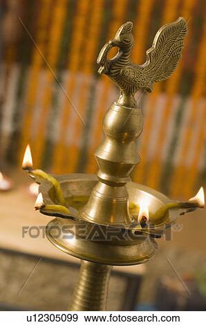 Stock Photo - Close-up of an oil lamp. Fotosearch