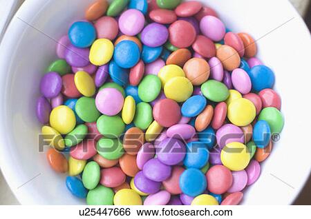 Stock Photograph - Close-up of candies in a bowl. Fotosearch