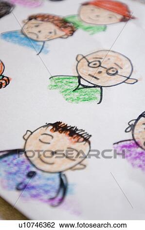 Stock Image - Close-up of cartoons painted on a sheet of paper. Fotosearch