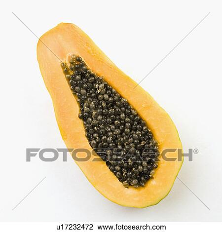 Stock Image - Close-up of cross section of a papaya. Fotosearch