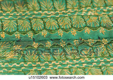 Close-up of embroidery on a fabric View Large Photo Image Stock Image - Close-up of embroidery on a fabric. Fotosearch