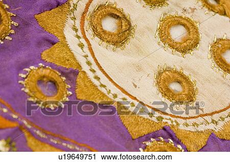Close-up of embroidery on a fabric View Large Photo Image Stock Image - Close-up of embroidery on a fabric. Fotosearch