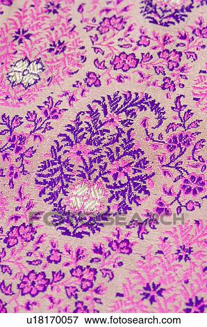 Close-up of embroidery on a fabric View Large Photo Image Stock Photo - Close-up of embroidery on a fabric. Fotosearch