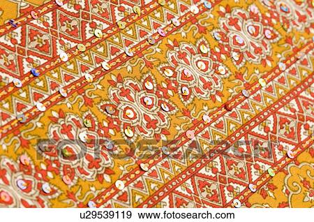 Stock Photo - Close-up of embroidery on a fabric. Fotosearch