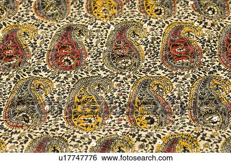 Close-up of embroidery on a fabric View Large Photo Image Stock Photograph - Close-up of embroidery on a fabric. Fotosearch