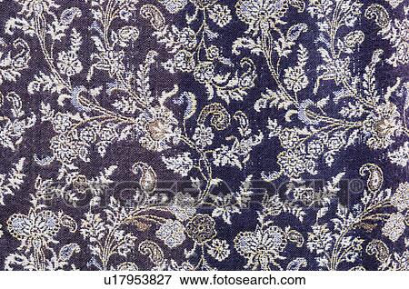 Close-up of floral patterns on textile View Large Photo Image Stock Photo - Close-up of floral patterns on textile. Fotosearch