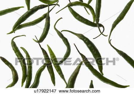 Close-up of green chili peppers View Large Photo Image Stock Photo - Close-up of green chili peppers. Fotosearch