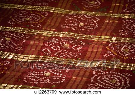 Close-up of pattern on a fabric View Large Photo Image Stock Photo - Close-up of pattern on a fabric. Fotosearch