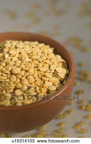 Close-up of Split Bengal grams in a bowl View Large Photo Image Stock Image - Close-up of Split Bengal grams in a bowl. Fotosearch