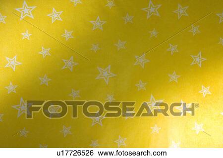 Stock Photograph - Close-up of stars on handmade paper. Fotosearch