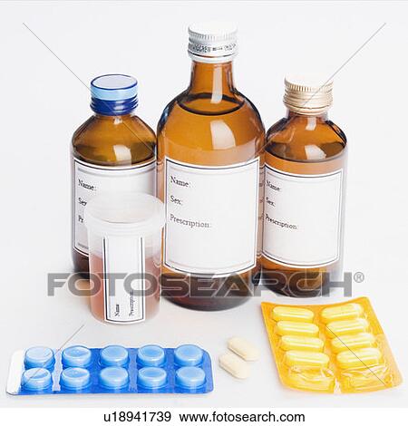 Stock Photo - Close-up of tablets and bottles. Fotosearch