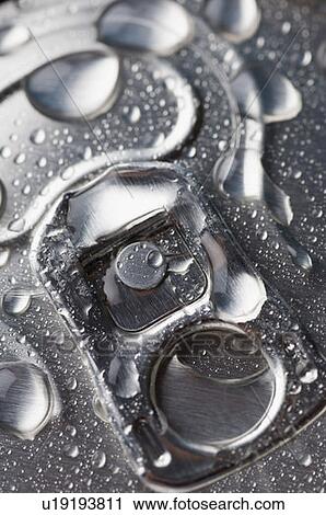 Close-up of water droplets on a drink can View Large Photo Image Stock Image - Close-up of water droplets on a drink can. Fotosearch
