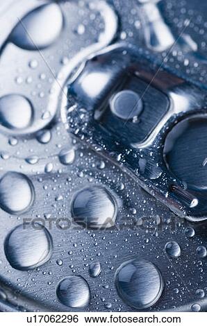 Stock Photograph - Close-up of water droplets on a drink can. Fotosearch