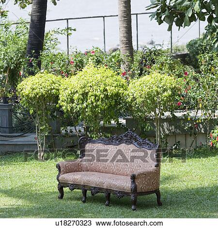 Couch in a park View Large Photo Image Stock Image - Couch in a park. Fotosearch