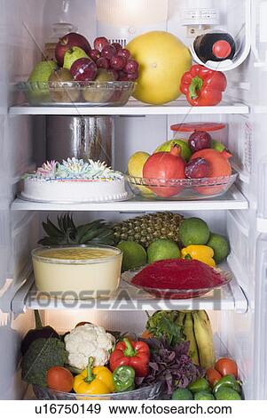 Fruits and vegetables in a refrigerator View Large Photo Image Stock Photo - Fruits and vegetables in a refrigerator. Fotosearch
