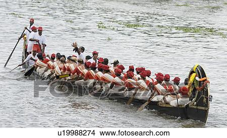 Group of people participating in a snake boat racing, Kerala, India View Large Photo Image Picture - Group of people participating in a snake boat racing, Kerala, India. Fotosearch