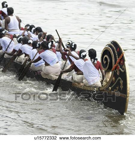 Group of people participating in a snake boat racing, Kerala, India View Large Photo Image Stock Image - Group of people participating in a snake boat racing, Kerala, India. Fotosearch