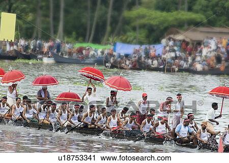 Group of people participating in a snake boat racing, Kerala, India View Large Photo Image Stock Image - Group of people participating in a snake boat racing, Kerala, India. Fotosearch