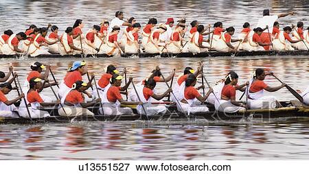Group of people participating in a snake boat racing, Kerala, India View Large Photo Image Stock Photo - Group of people participating in a snake boat racing, Kerala, India. Fotosearch